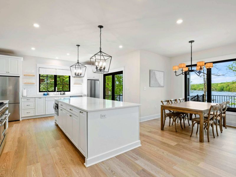 Simply Connected – Nestled between the kitchen and deck, this bright space makes togetherness feel completely natural.