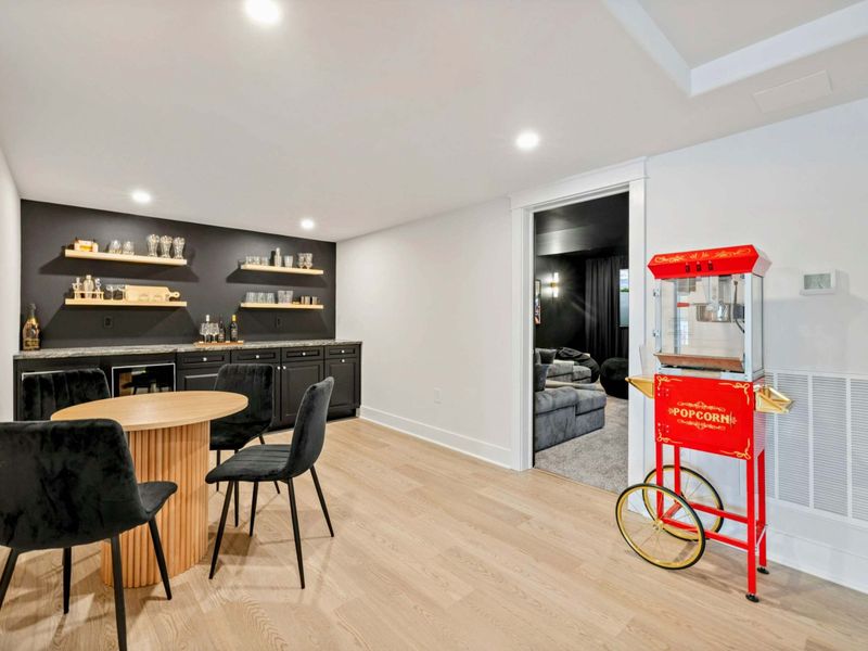 The Lounge Before the Lounge – Pour a drink, deal a hand, or enjoy a quiet glass in the modern café corner just outside the theater.