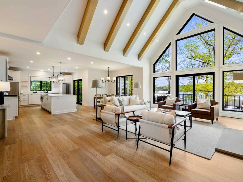 Where Everything Connects – From lake to kitchen to great room, this open-plan space keeps everyone close and every moment easy.