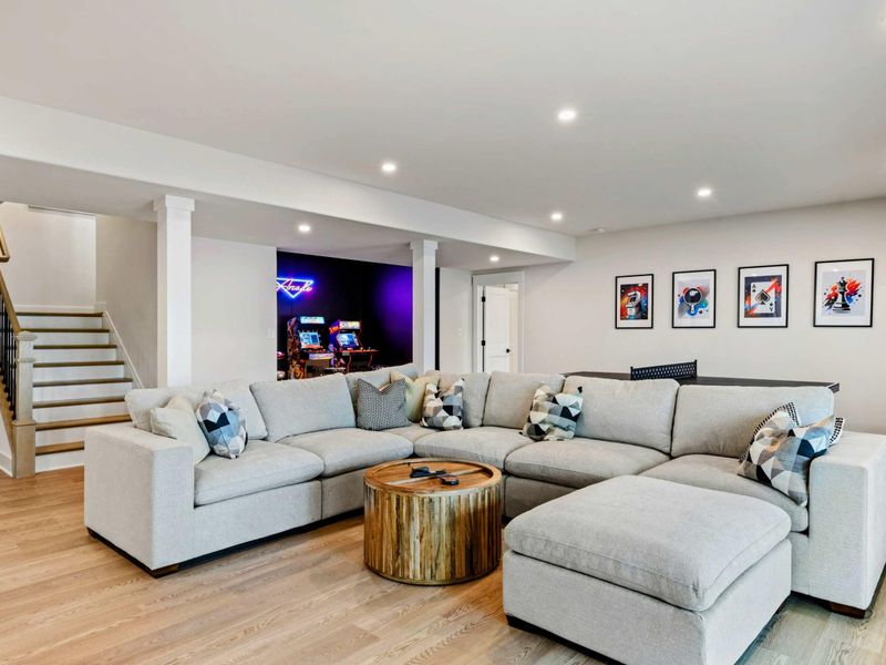 Recharge & Reconnect – This cozy lounge flows right into the arcade—making it easy to switch from movie mode to game night.