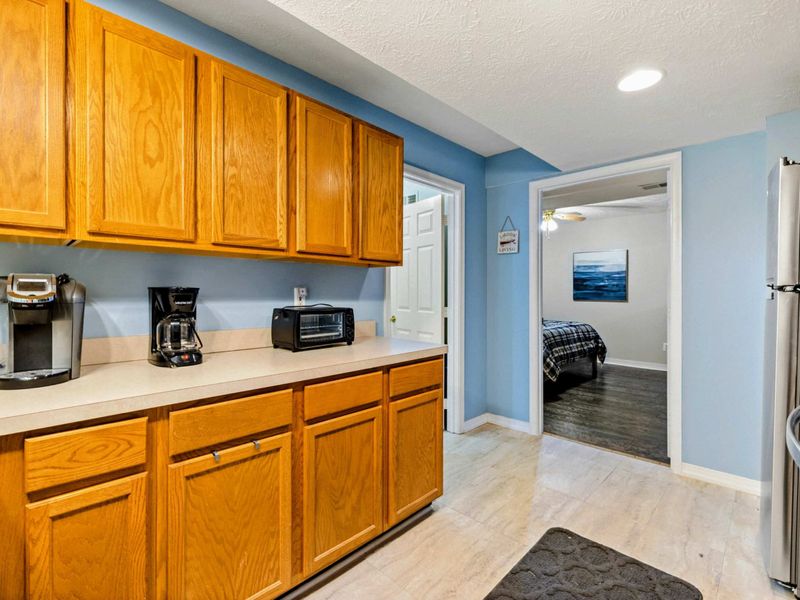 Quiet Mornings, Separate Spaces – Start your day slowly in this tucked-away kitchen retreat.