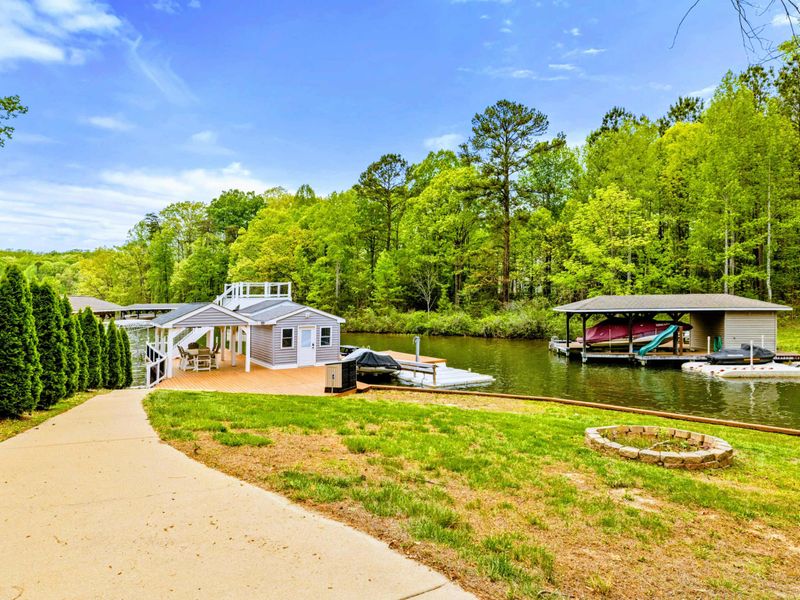 Where Fires Glow and Boats Go – S’mores on shore, stories on the water—this spot does both.