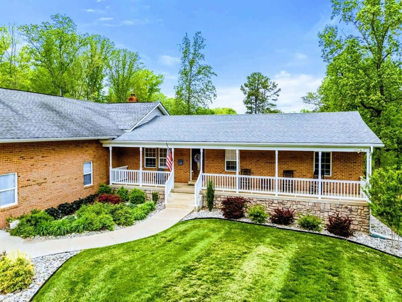 Where the Welcome Begins – A front porch that says, “come in, kick back, stay a while.”