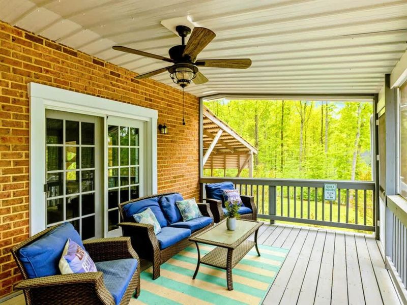 Comfort in the Canopy – Morning coffee or evening wine—this porch knows how to hold the moment.