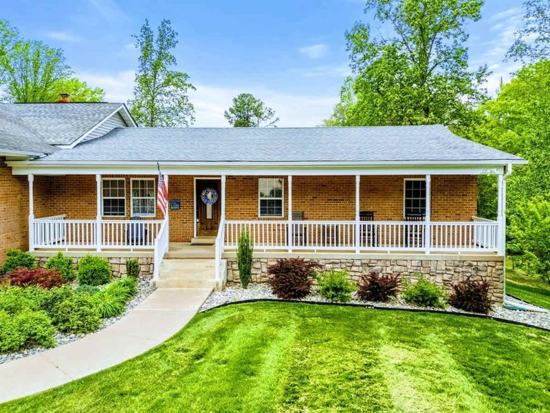 Where the Welcome Begins – A front porch that says, “come in, kick back, stay a while.”