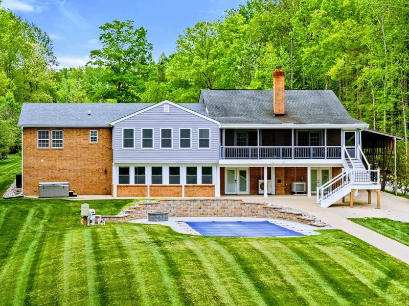 Where the Outdoors Meet Home – From porch chats to poolside dips, this space brings it all together beautifully.