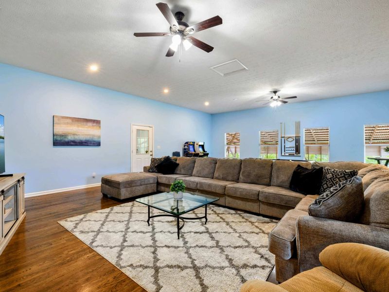 All Together Now – Movie nights, midday naps, or rainy-day games—this room brings everyone in.