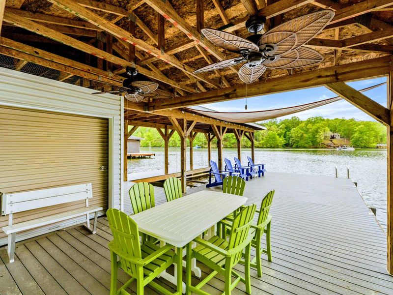 Shade, Stories & Second Helpings – This breezy corner is made for laughter, lakeside lunches, and easy conversation.