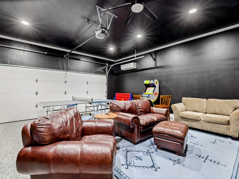 Let the Games Begin – Ping pong, arcade battles, and comfy seats for cheering it all on—this room brings the fun.