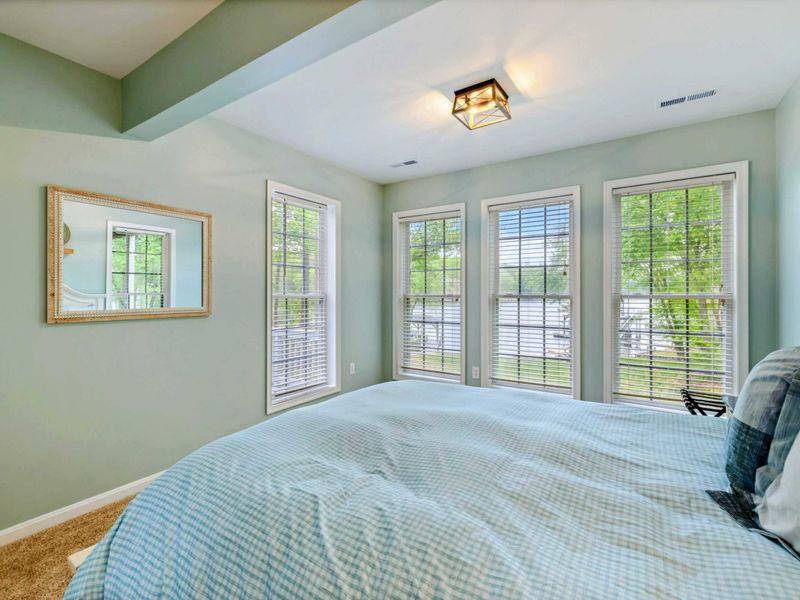 Lake Views from the Covers – Let the sun drift in and the day come to you—this room was made for peaceful starts.