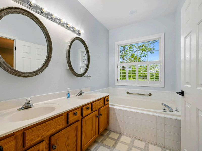 Space for Two, Peace for You – A double vanity and soaking tub make getting ready (or winding down) feel effortless.
