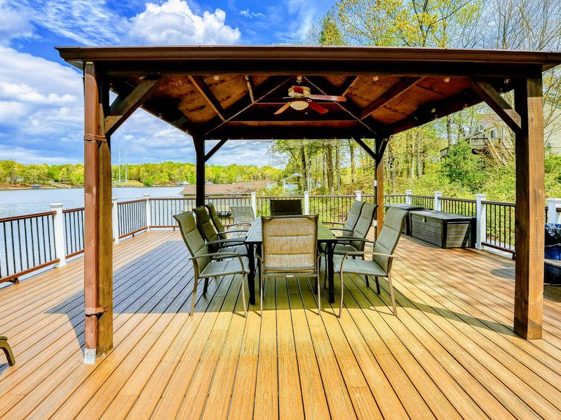 Dock Gazebo - Covered dining area with ceiling fan and open lake views from the upper sundeck.