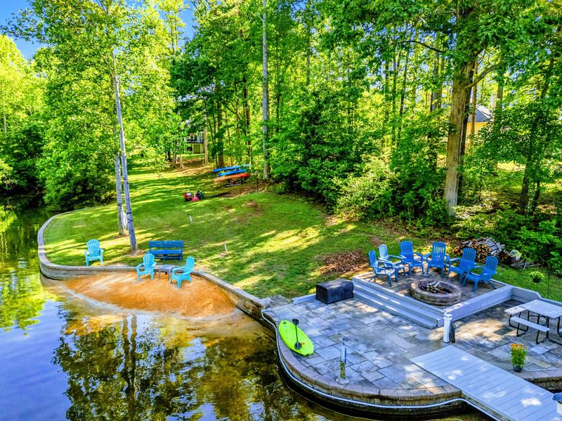 Where the Lake Day Unfolds – Whether it’s a splash in the shallows, a nap in the shade, or s’mores by the fire, this shoreline has you covered.