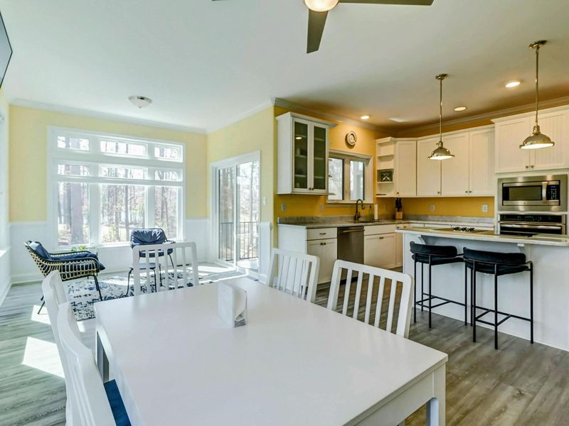 All Together Now – From cooking to coffee to catching up, this open layout brings everyone into the conversation.