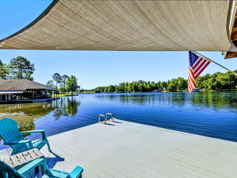 A Front-Row Seat to Lake Life – Protected by shade and surrounded by still water—this is the pace of the private side.