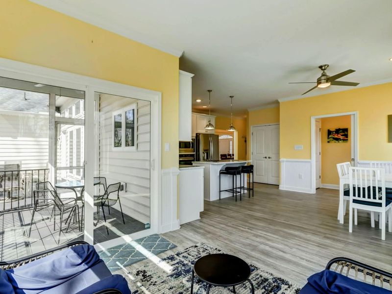 Spaces That Flow, Moments That Stay – From kitchen to porch to sunroom, this layout keeps everyone close and connected.