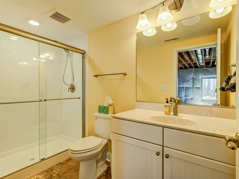 Clean and Convenient – A bright, modern full bath tucked off the basement, perfect for lake-day cleanup or to keep the fun flowing.