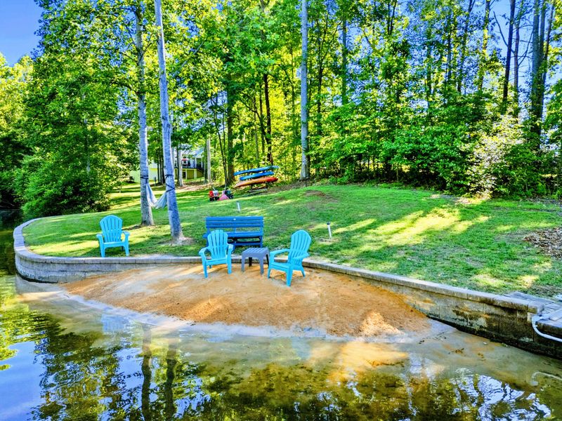 A Quiet Cove for Slow Moments – Let the kids wade while you sink into a chair and enjoy the breeze beneath the trees.