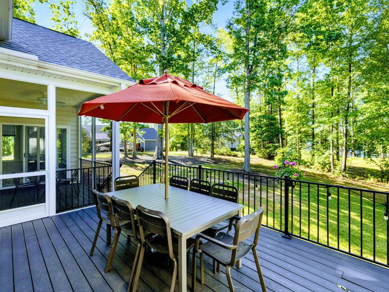 Meals Just Taste Better Out Here – Surrounded by trees and sunlight, this outdoor table is ready for every kind of gathering.