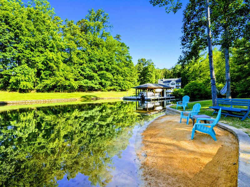 Sit, Splash, and Soak It All In – This tucked-away sandy nook is perfect for kids at play or grownups at rest.