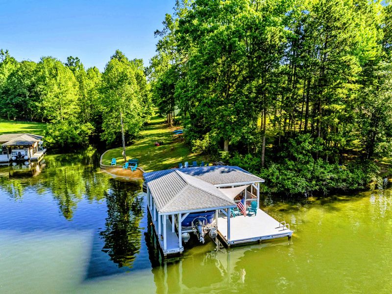 Lakeside Living, Fully Framed – Paddle, lounge, splash, or swing—every piece of your lake day is right here in one perfect view.
