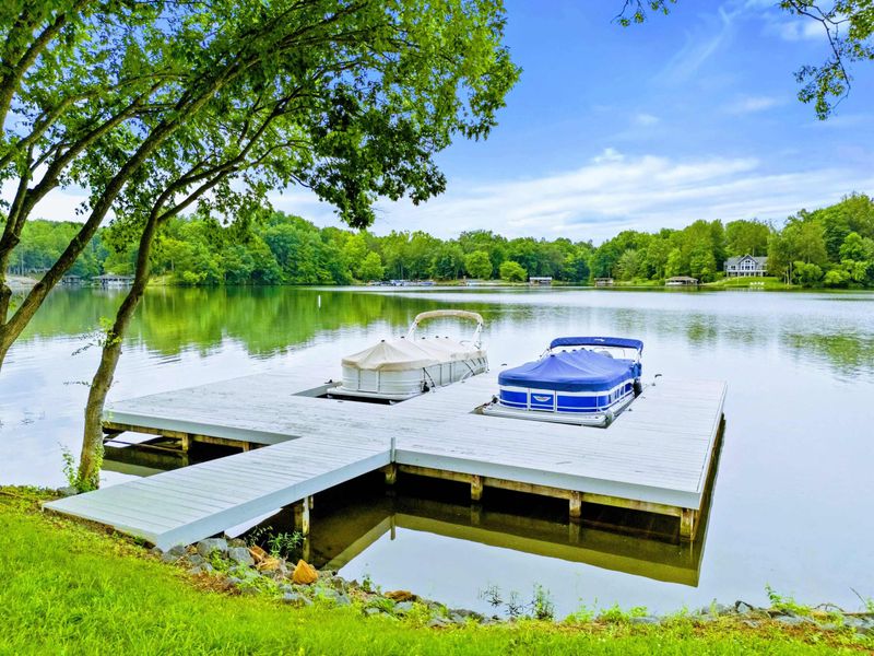 Dock View - From the dock, the calm water stretches wide, perfect for morning swims, fishing, or just watching the boats go by.