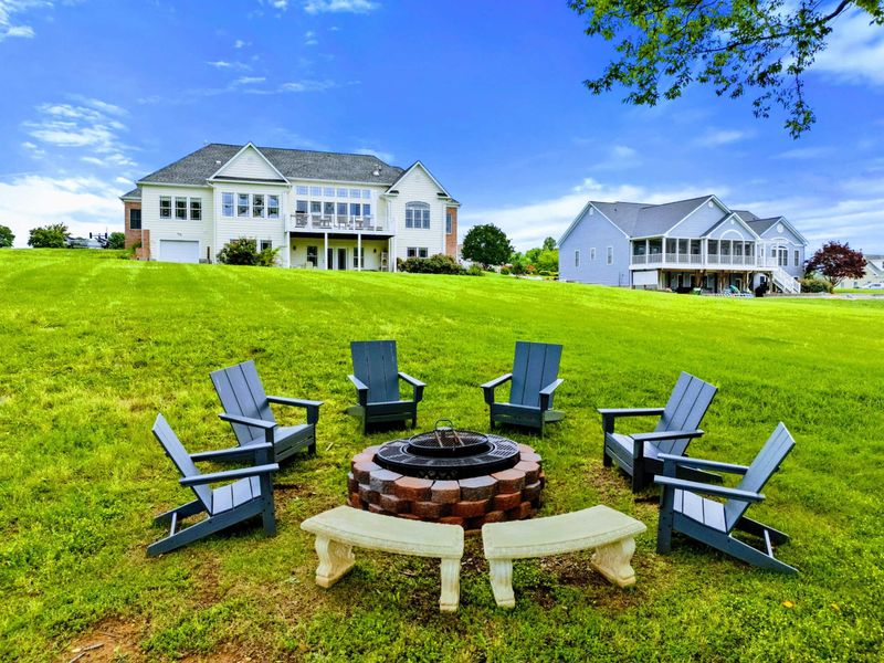 Fire Pit and Home - Looking back from the fire pit, the home stands across a generous yard with plenty of room to play.