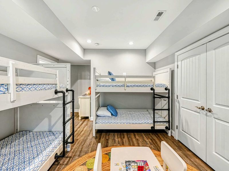 Bunk Room Bliss – A cozy setup where cousins and kids drift off happy after a full lake day.