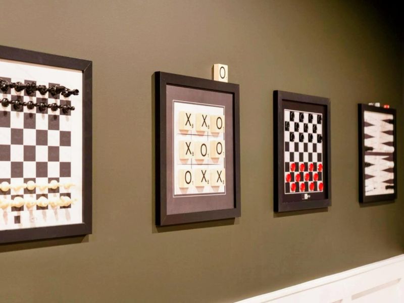 Thoughtfully Playful – Elevated design with a subtle invitation to unwind and compete.