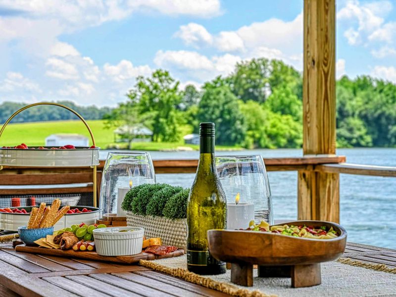 Dock Hangout - Snacks, a table, and the water right there. The kind of spot where lunch turns into the whole afternoon.