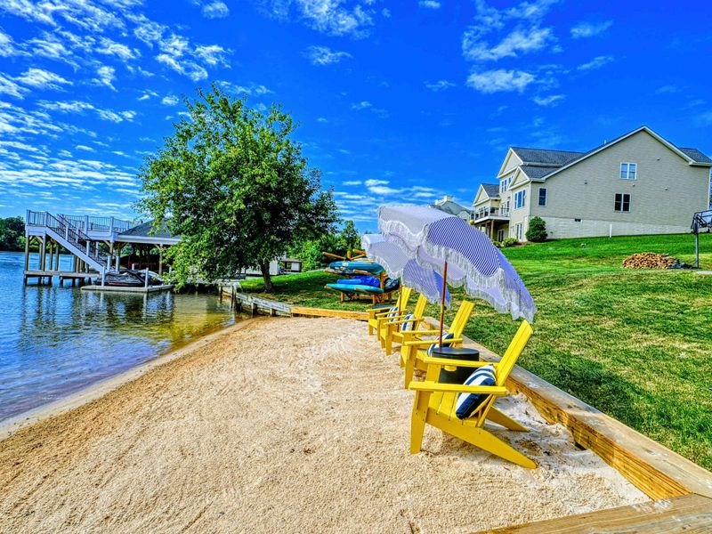 Shoreline - Kayaks on the sand, a soft beach underfoot, and calm water just steps away whenever you are ready to launch.