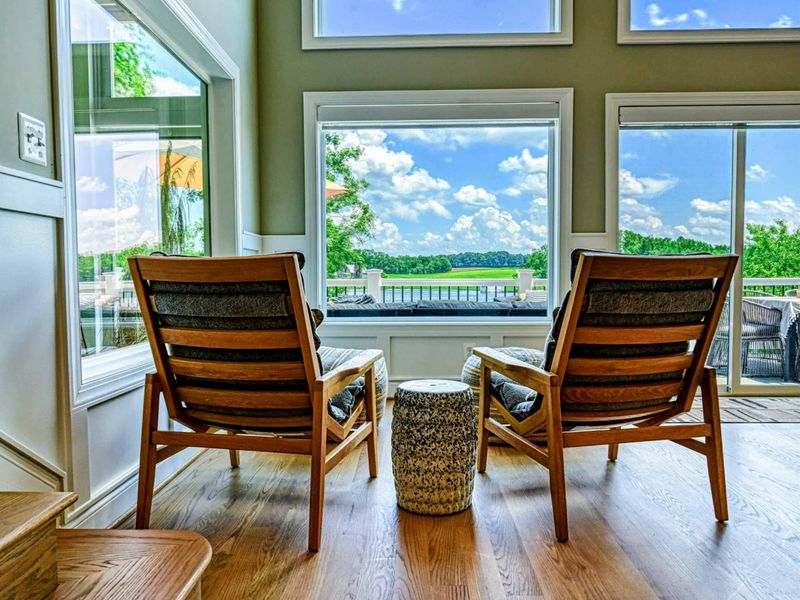 Sunrise Conversations – Coffee in hand, hearts full, and the day unfolding beyond the glass.