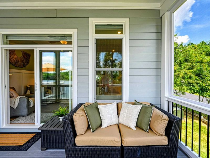Porch Time, Upgraded– A cozy spot to reconnect while the lake breeze drifts by.