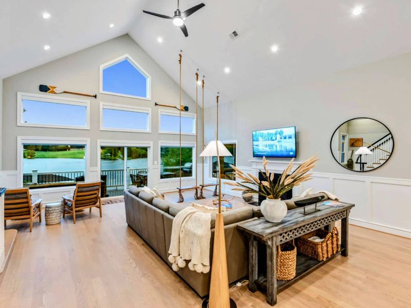 Kitchen Island - Quartz counters, a working layout, and fresh details that welcome the cook's audience to settle in.