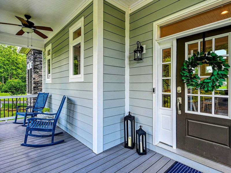 A Warm Arrival – Rocking chairs, quiet shade, and that first exhale when you finally make it.
