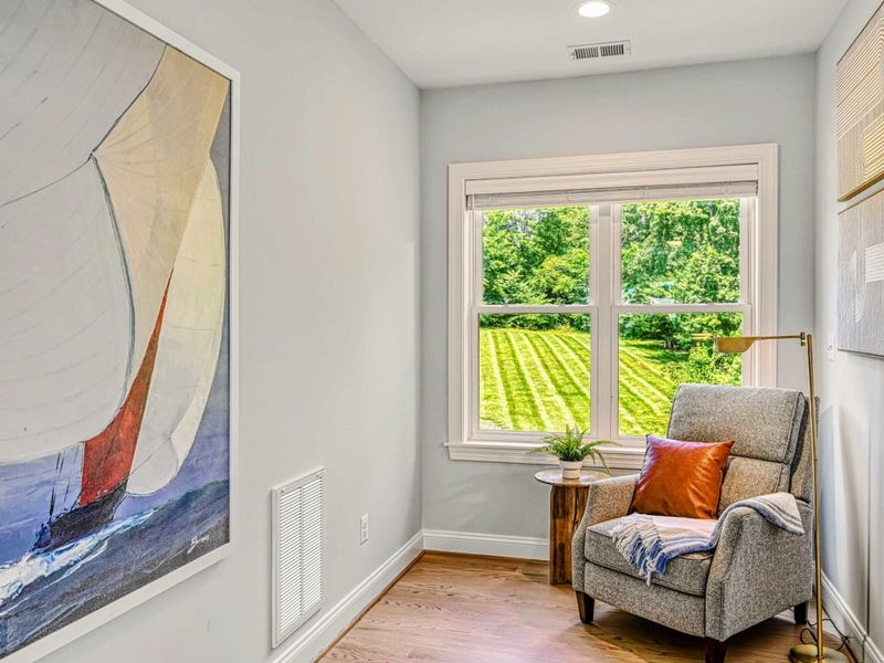 A Quiet Corner to Reconnect – Curl up with a book while the house hums softly around you.