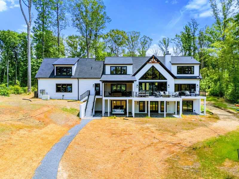 Exterior - Big decks, open flow, and a welcoming feel that turns weekends into traditions at the lake.