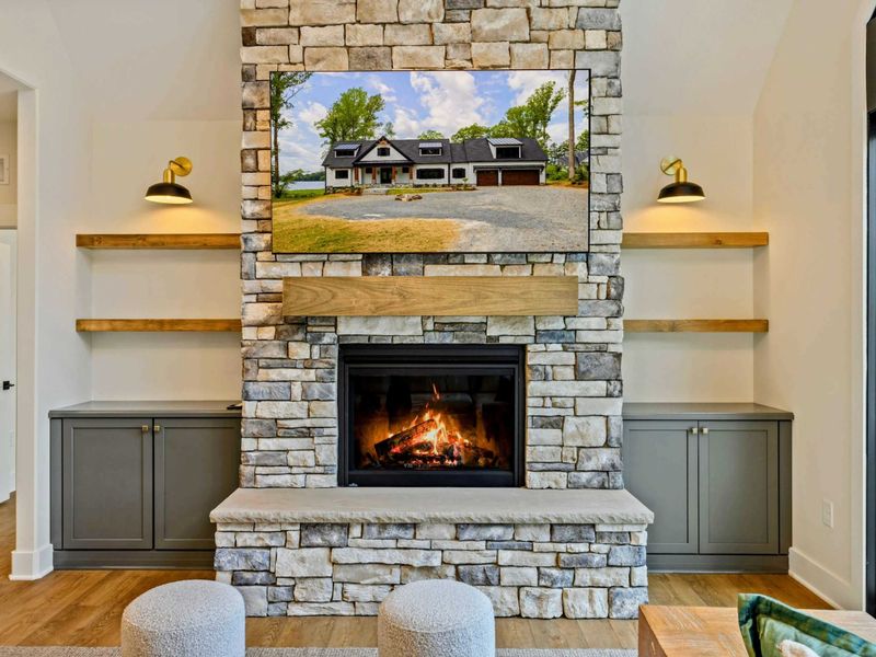 Upper Landing - The loft overlook offers a dramatic view down into the great room and out to the lake.