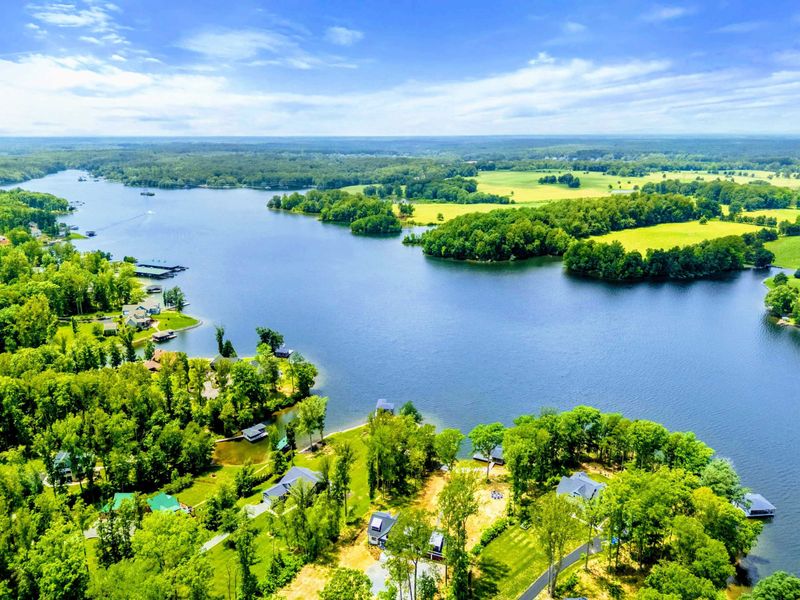 Aerial View - Wide-water views of Lake Anna showcase the peaceful Private Side, with wooded shorelines and open water.
