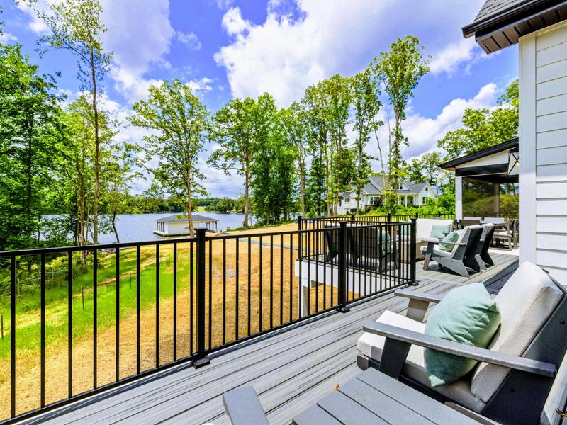 Backyard - Settle in together on the lawn and watch the day unfold from the grass to the shoreline.