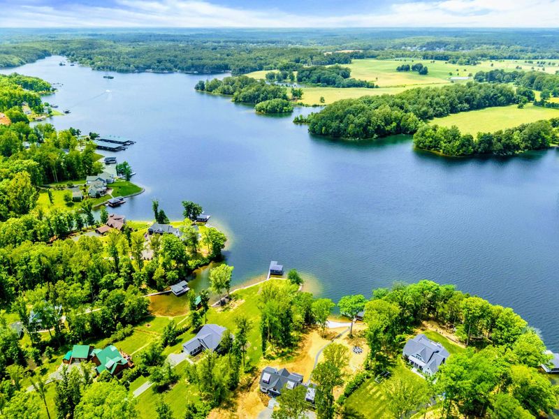 Aerial View - Another angle of the Private Side reveals the lake's winding coves, docks, and tree-lined shores.