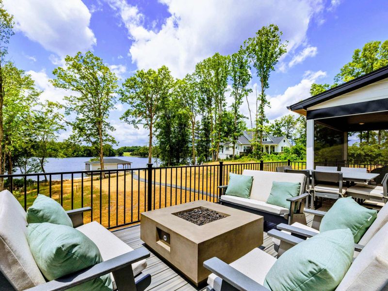 Upper Deck - A private vantage point overlooking the yard, fire pit, and shoreline below.