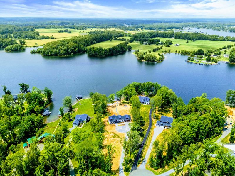 Aerial View - A panoramic perspective showing the property's position on a private peninsula of Lake Anna.