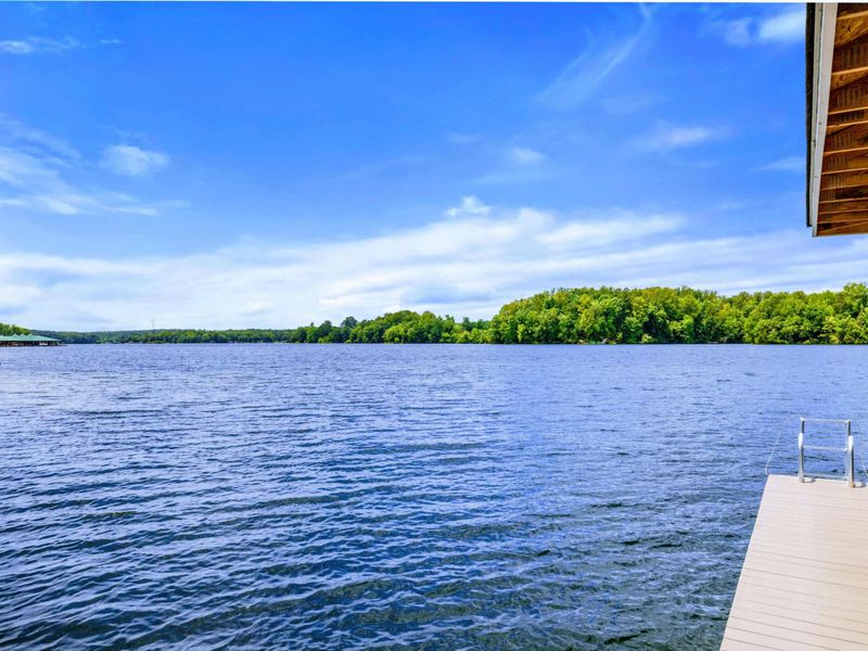 Backyard - Wide water, soft light, and the kind of quiet you can actually feel from the private shoreline.
