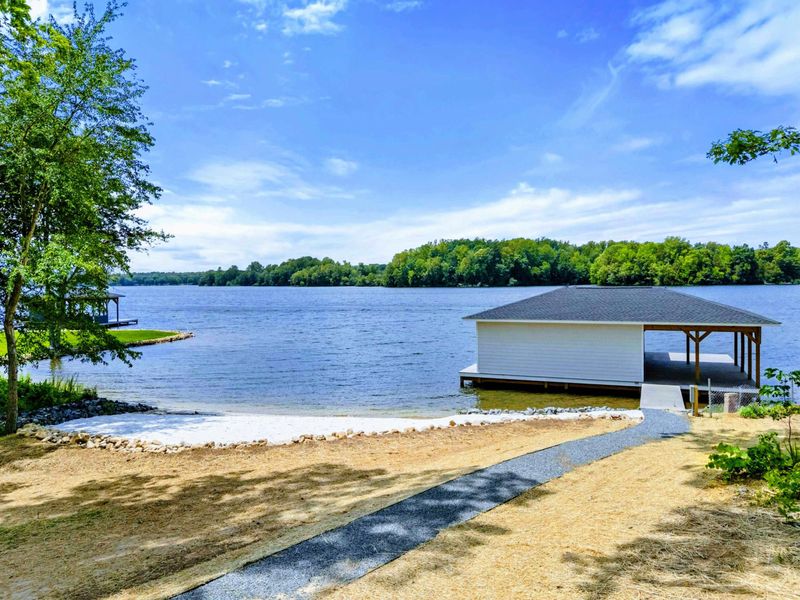 Backyard - An easy walk down to sand, swims, and dock days with no planning required.