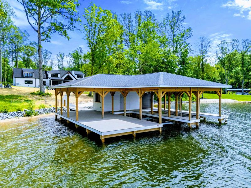 Boat Dock - A covered waterfront setup with timber framing that makes boating, lounging, and sunset watching feel effortless.