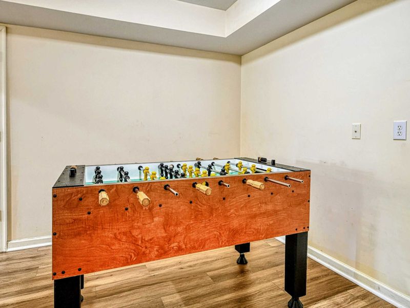 Game Room - Foosball table close-up, ready for tournament play.