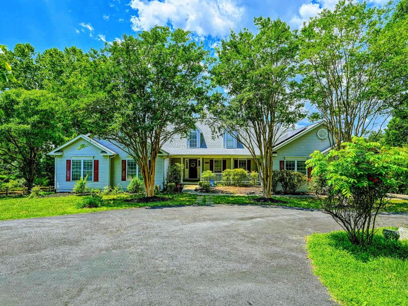 This home is huge - over 5100 square feet on three levels. Front, lots of parking, two driveways.
