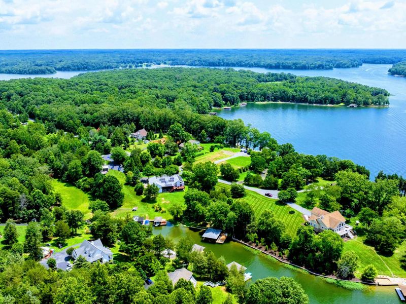 Aerial - Panoramic Lake Anna view from high altitude showing the expansive waterway and wooded shoreline.