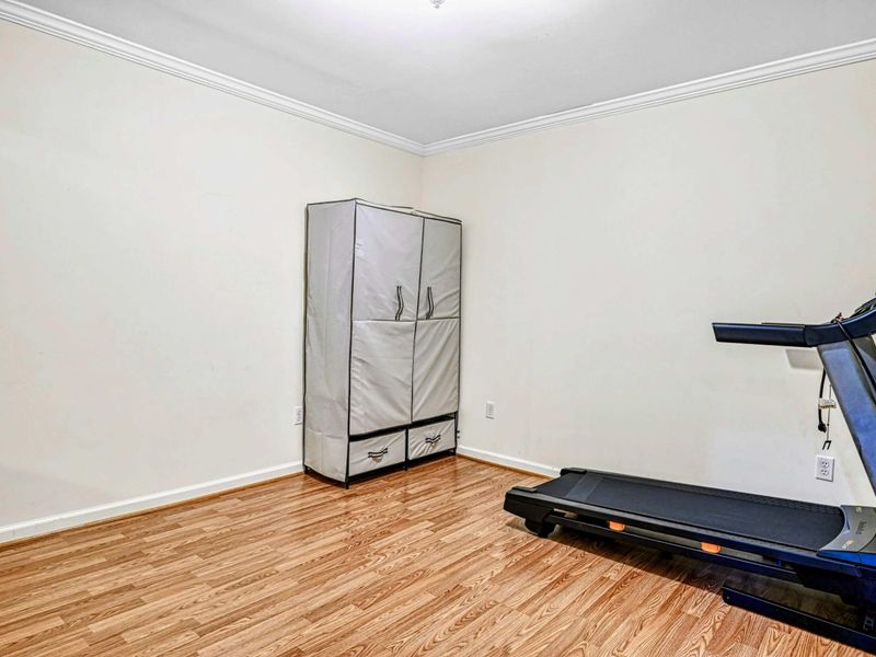 Fitness Room - Treadmill and storage wardrobe on the lower level for staying active during your stay.